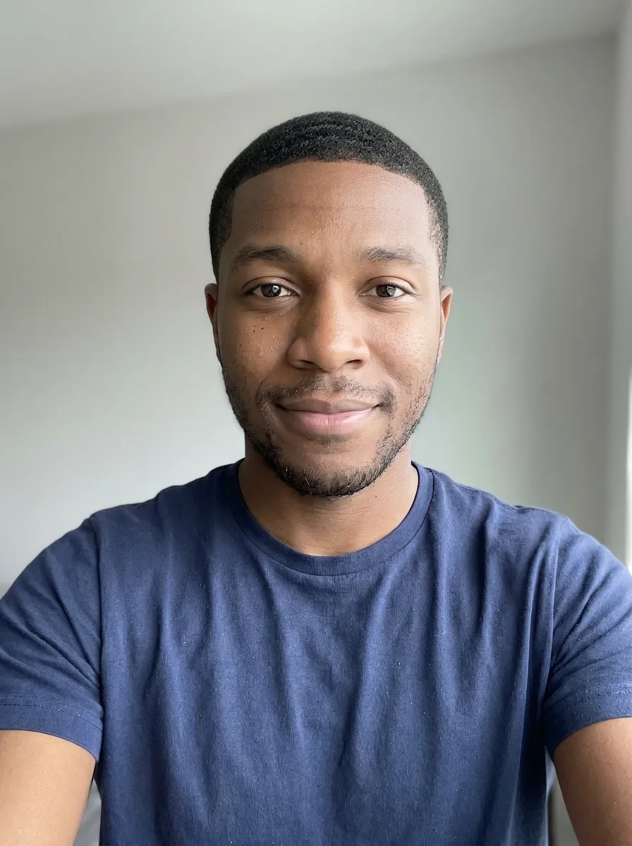 The same man with a short buzz cut